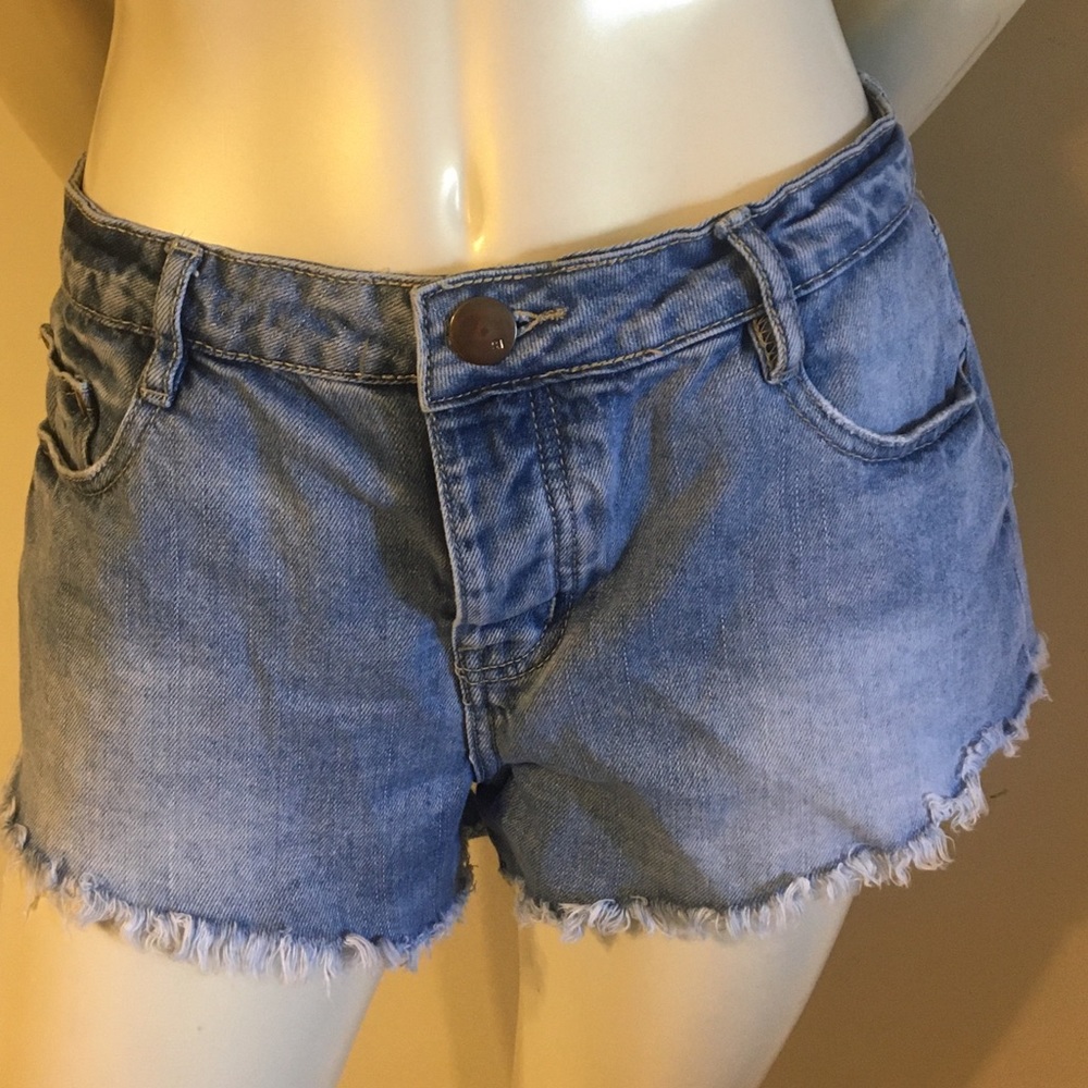 The Frayed mid rise distressed shorts 8
